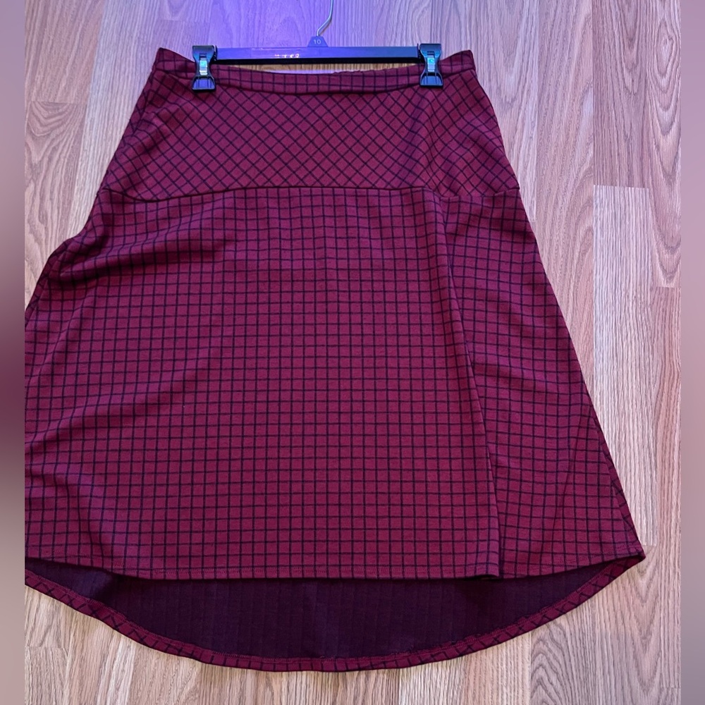 NY collection high low skirt. Burgundy and black. Gently used. Size medium.